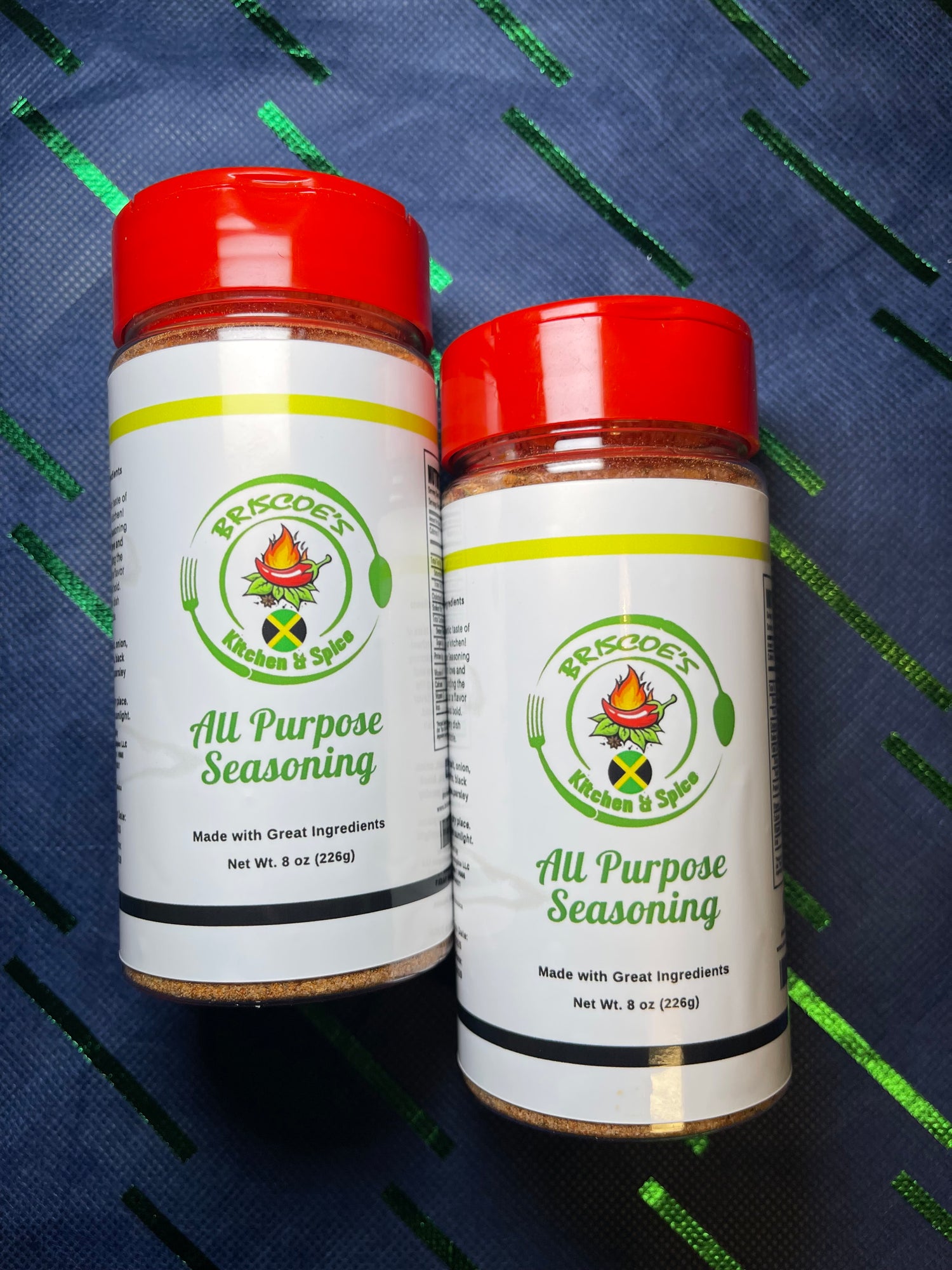 Two bottles of Briscoe's Island Gold All-Purpose Seasoning.